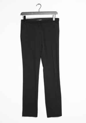 Pantalon noir ajusté exposé sur un cintre. Il présente une texture lisse, un devant plat, et ne comporte aucun motif visible ou matériel distinctif.
