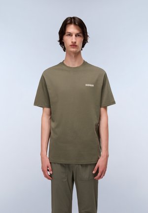Olive green cotton T-shirt with short sleeves, round neckline, and small logo detail on the chest. Smooth texture, regular fit.