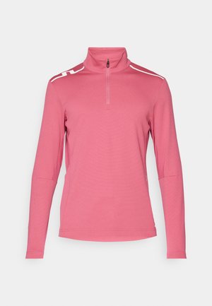 Roosa pikaaegne pullover poolelt tõmbeahelaga kaelust, millel on valged aktsentribad õlgadel ja sile tekstuuriga kangas.