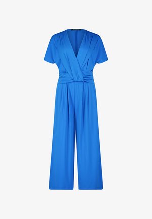 Jupe bleu avec des manches courtes, un corsage style enveloppant et un pantalon à jambes larges. Fabriqué en tissu lisse, présentant des plis aux épaules et à la taille.