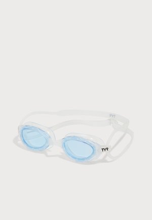 Swim goggles with light blue lenses, clear silicone frame, and transparent adjustable straps; TYR logo on the side.