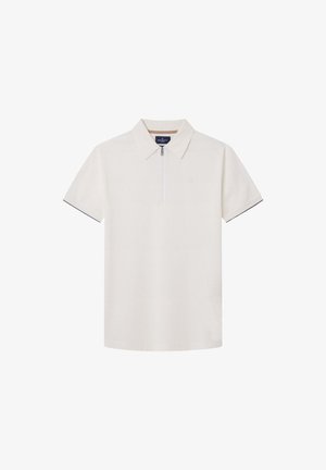 Pikee lyhythihainen off-white-värissä, jossa on vetoketjukaulus. Materiaali on teksturoidu ja hihoissa on kontrastiväriset tummansiniset yksityiskohdat.