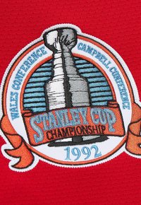Embroidered Stanley Cup patch on red fabric, featuring Stanley Cup trophy, "Wales Conference," "Campbell Conference," and "1992" text.