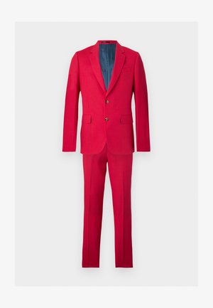 Rood tweedelig pak met een colbert met ingesneden revers, twee knopen en klepzakken, gecombineerd met bijpassende, op maat gemaakte broek.