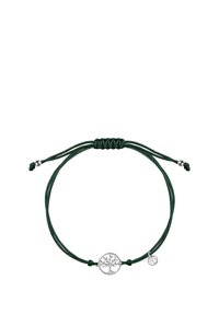 Zielona bransoletka sznurkowa z zawieszką w kształcie srebrnego drzewa życia z wyciętym wzorem oraz małym akcentem w postaci srebrnej zawieszki. Z regulowanym zapięciem na sznurek.