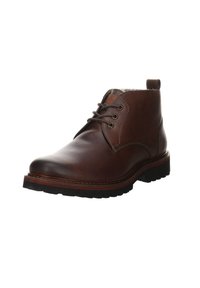 Bottines en cuir marron avec une finition lisse, un bout rond et deux œillets. Dotées d'une semelle en caoutchouc durable et de détails de couture subtils.