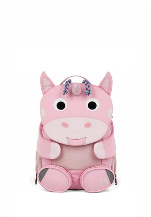 Pink children's backpack shaped like a smiling unicorn with ears, horn, large eyes, and paw-shaped front pockets.