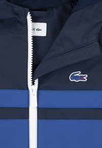 Lacoste Lahka jakna - marine