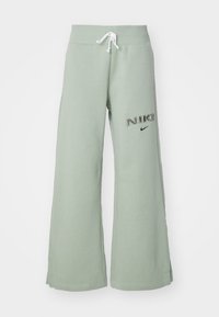 Nike Sportswear LOGO - Treniņtērpa apakšdaļas - jade horizon