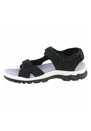 Black outdoor sandal featuring synthetic straps, adjustable Velcro closures, a cushioned gray footbed, and a textured black rubber sole.