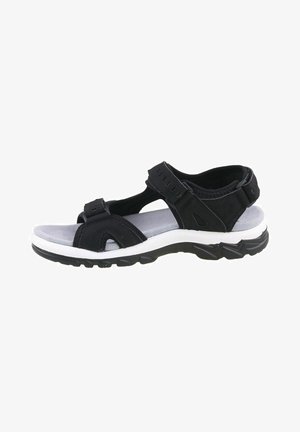 Black outdoor sandal featuring synthetic straps, adjustable Velcro closures, a cushioned gray footbed, and a textured black rubber sole.