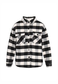 Camicia in flanella a quadri bianca e nera con colletto, chiusura a bottoni, due tasche sul petto e vestibilità rilassata.
