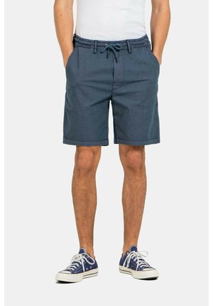 Pantalones cortos azul marino hechos de tela ligera, con una cintura elástica con cordón, bolsillos laterales y un ajuste relajado.