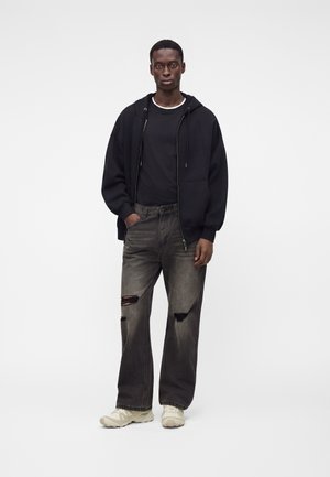 Wasted Paris, SCRIPT BARRET PANT UNISEX - Дънки със свободна кройка - dust grey