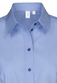 Light blue button-up shirt with a crisp collar, smooth texture, and dark blue buttons. Features a label with a flower design.