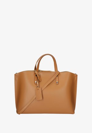 Tan leather tote bag with dual top handles and a detachable shoulder strap. Smooth texture, silver-tone hardware, and a tag detail.