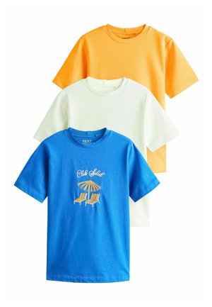 Three short-sleeve t-shirts in orange, white, and blue, with the blue shirt featuring "Club Soleil" text and beach chair umbrella graphic.