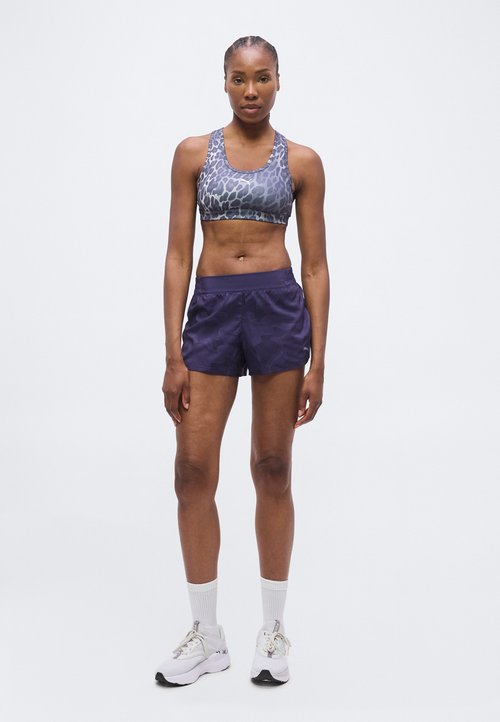 PUMA 4KEEPS BRA - Medium support sports bra - inky depths — photo 2