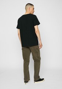 Mister Tee BALL LIFESYTLE TEE - Triko s potiskem - black