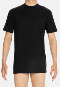 T-shirt nera a maniche corte in cotone. Collo tondo e orlo dritto. Tessuto liscio, design semplice, vestibilità standard.