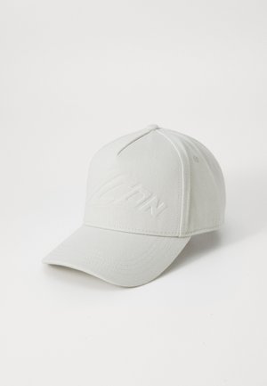 White baseball cap made of textured fabric, featuring a front embroidered logo, curved brim, and six-panel design with stitching accents.