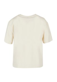 Cream short-sleeve cotton t-shirt with a round neck, featuring a relaxed fit and straight hem. No distinct patterns or accents.