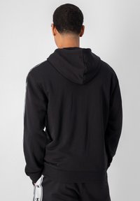 Champion AMERICAN TAPE - Jersey con capucha - black