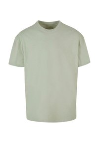 Lys grøn bomulds t-shirt, korte ærmer, rund hals, afslappet pasform, glat tekstur, ingen synlige mønstre eller udsmykninger.
