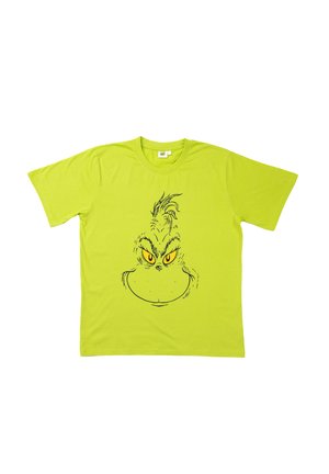 T-shirt in cotone verde lime con una linea nera che disegna il volto di un personaggio scontroso, con grandi occhi gialli e capelli appuntiti.