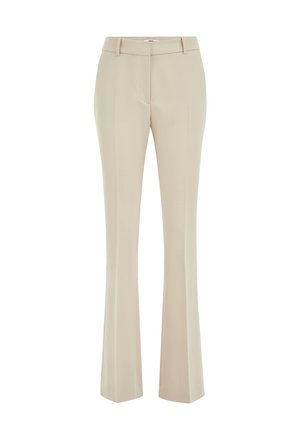 Bēša pielāgotas izdarenas bikses no gludas auduma ar vidējās jostasvietas augstumu, jostas cilpām un piegulošu pieguļumu gurnu līmenī.