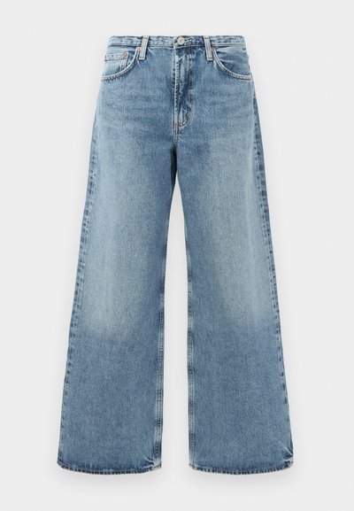 Light blue denim wide-leg jeans with a high waist, traditional five-pocket design, visible stitching, and a raw hem finish.