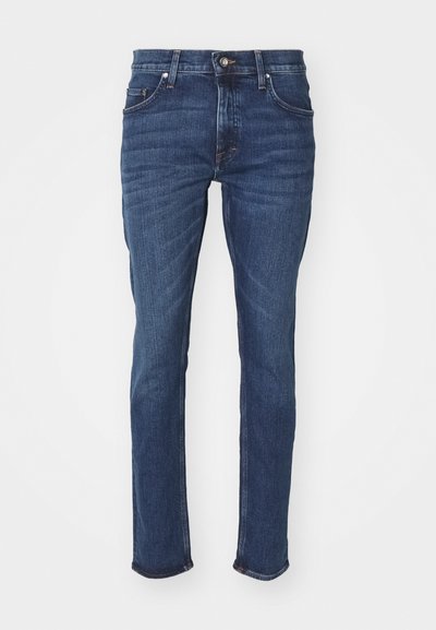 Mørkeblå denimjeans, slim fit, med et klassisk femlommers design, kontrasterende søm og rett benklipp.