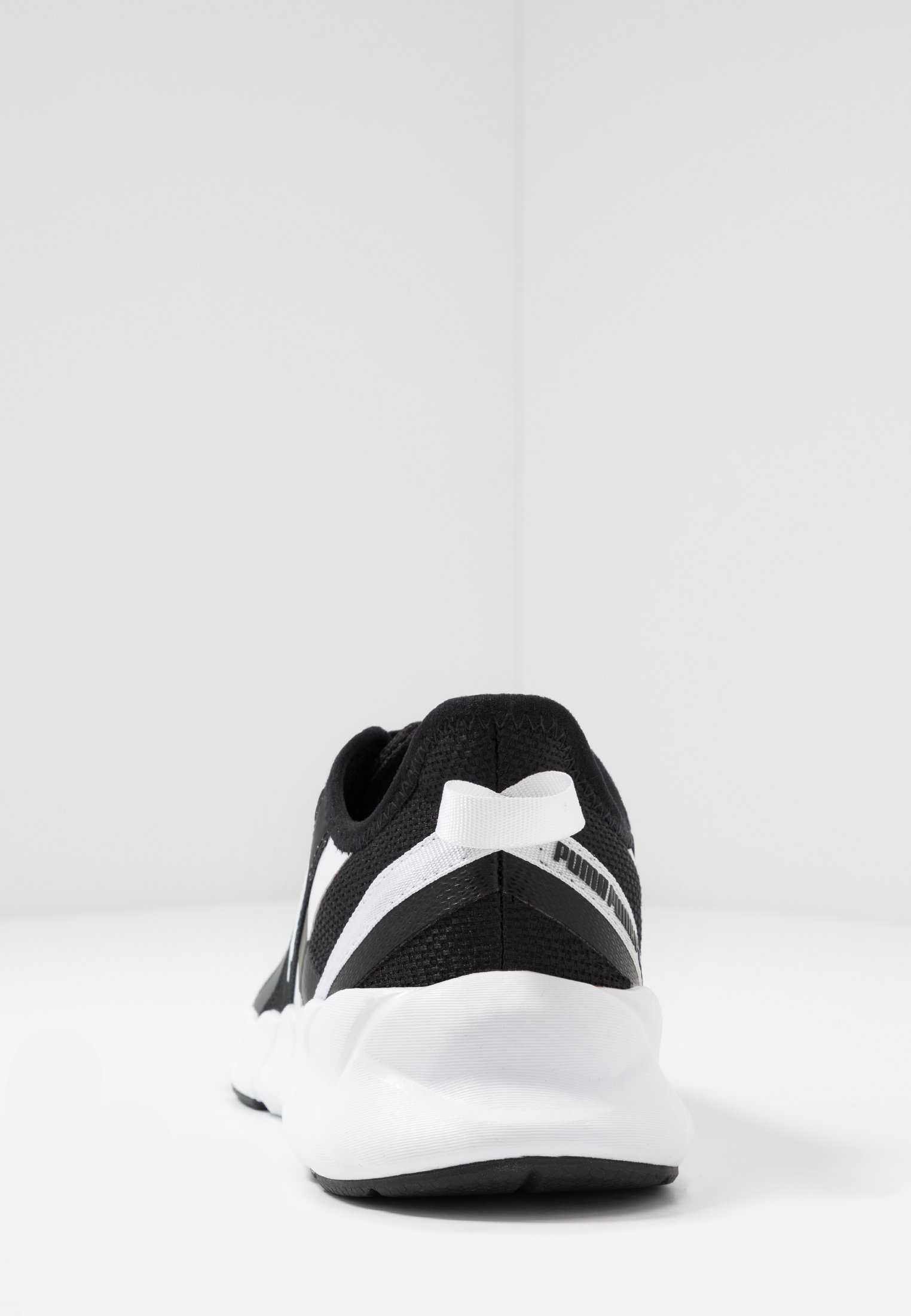 Puma WEAVE XT - Zapatillas de running estables - black/white/negro -  Zalando.es