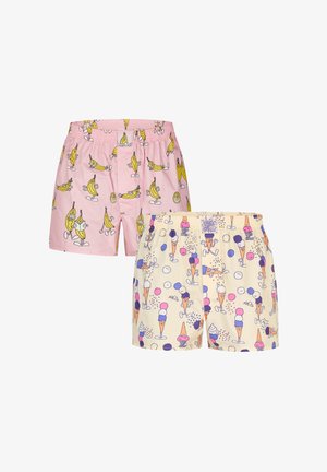 Set of two boxers: one pink with banana print, the other cream with ice cream cone patterns; elastic waist, cotton material, playful design.