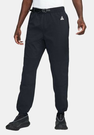 TRAIL  - Tracksuit bottoms - dark blue