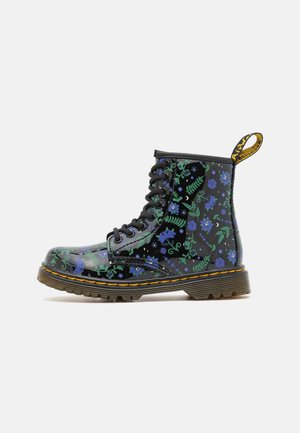 dr martens lacets jaunes