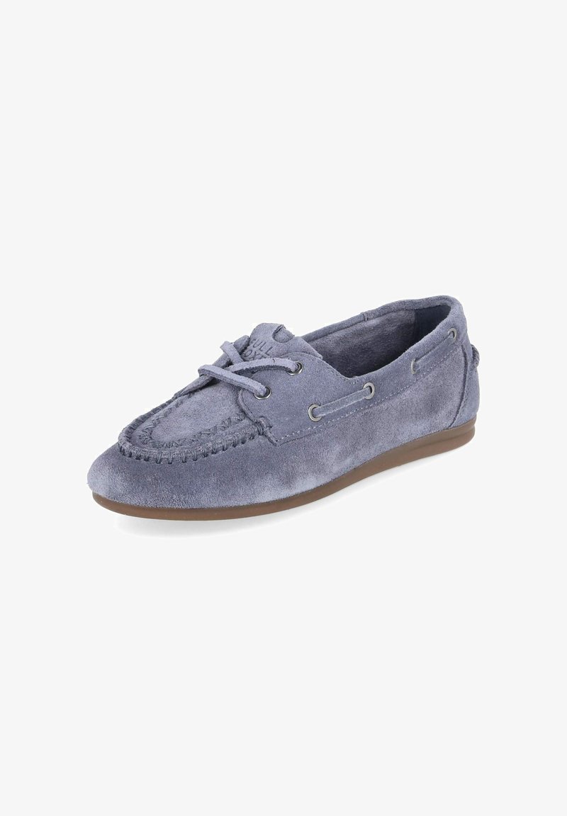 Mocassin en daim bleu marine doux avec un détail à lacets et une semelle plate marron, conçu pour un usage décontracté.