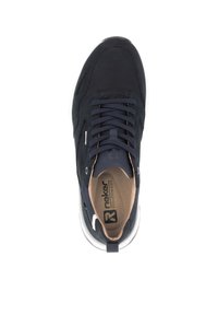 Dark navy sporty sneaker with lace-up design, textured upper, white sole, and branding on the insole. Features reinforced eyelets and cushioned lining.