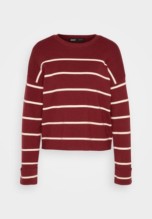 Bordo skrajšan pulover s kremnimi vodoravnimi črtami, okroglo ovratnikom in manšeto dolgimi rokavi. Mehka tekstura in sproščen kroj.