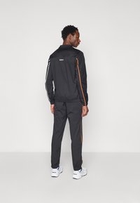 Lacoste Sport TRACKSUIT TENNIS PLAYERS SET - Træningssæt - black