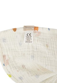 Muslin cloth with a soft, textured surface, featuring a cream base and scattered colorful patterns of various shapes. Labels visible.