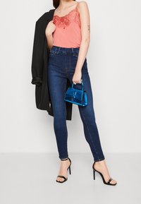 Soaked in Luxury Linne - pink