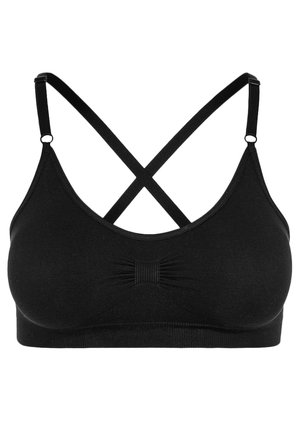 Bralette noire avec des bretelles croisées, texture lisse, léger froncé au centre et une large bande en bas pour le soutien.