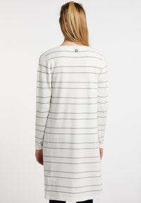 Šaty s dlouhým rukávem v off-white barvě s šedými vodorovnými pruhy. Mají boční rozparky a kulatý výstřih na zádech s logem.