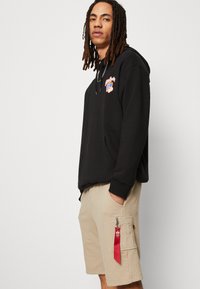 Alpha Industries X-FIT - Tepláky - vintage sand