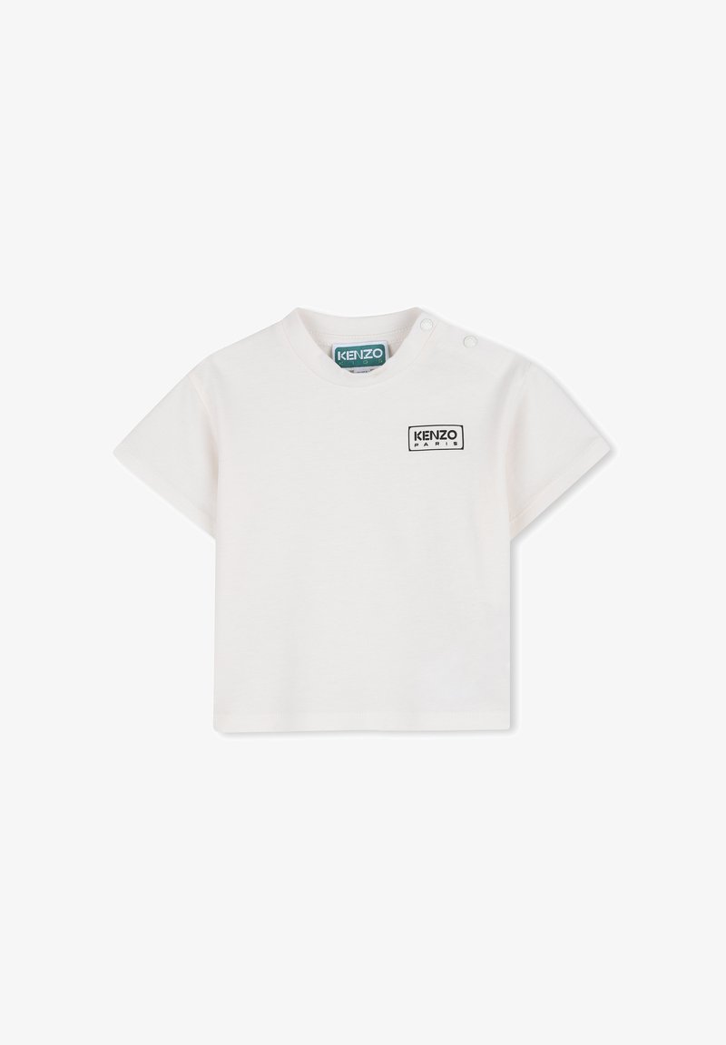 Witte T-shirt met korte mouwen gemaakt van katoen met een ronde hals. Voorzien van een zwart KENZO Paris logo-badge op de linkerborst en drukknoopdetail.