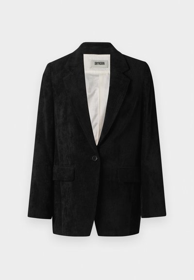 Blazer en velours côtelé noir avec une fermeture à un bouton, revers à encolure crantée, deux poches avant et une doublure intérieure lisse. Tissu texturé avec des côtes verticales.