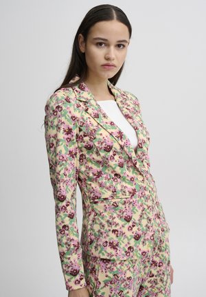 Floral blazer in pastel shades, featuring a fitted design, notched lapels, and a two-button closure. Textured fabric with multicolored patterns.