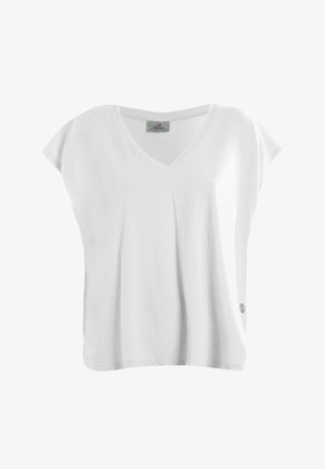 Camiseta blanca de algodón para mujer, de manga corta y escote en V, con un ajuste holgado y un pequeño logo cerca del dobladillo en el lado derecho.