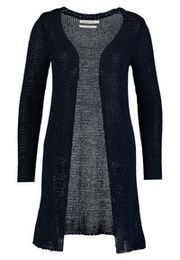 Stickad kavaj i mörk marinblå, med en halvgenomskinlig design, långa ärmar, öppen front och en något svängd nederkant med ribbade kanter.